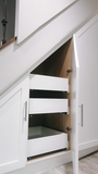 Every home can use more storage. Fortunately, the often-neglected space beneath a staircase provides an ideal spot for that.  From  coat closet, kitchen pantry , home office to bookshelves. The options are virtually endless. 